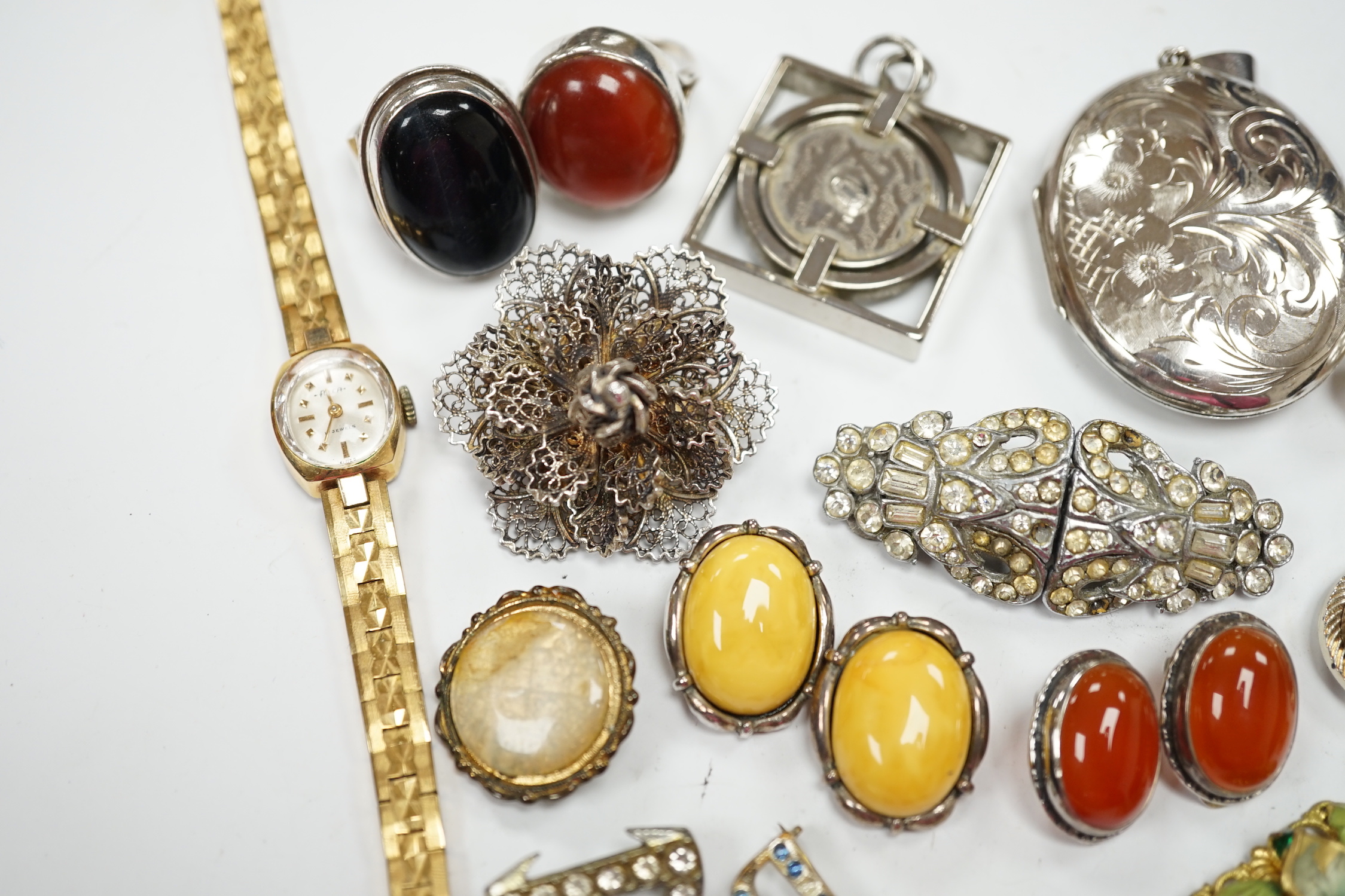 A silver and cabochon set dress ring, mixed costume jewellery and a lady's wrist watch.